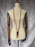 Collar largo cuerno beige