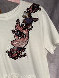 Camiseta larga con parche