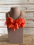 Collar pétalos naranja