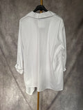 Camisa blanca pliegues