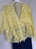 Blusa volantes amarilla