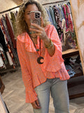 Blusa animal print naranja flúor