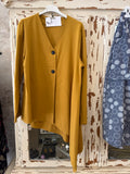 Chaqueta asimétrica mostaza