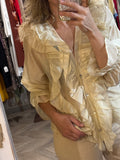 Blusa volantes beige