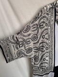 Kimono bordado con flecos
