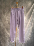 Pantalón polipiel malva