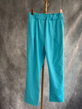 Pantalón polipiel turquesa