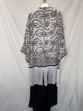 Kimono bordado con flecos
