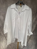 Camisa blanca pliegues