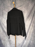 Chaqueta flecos negro