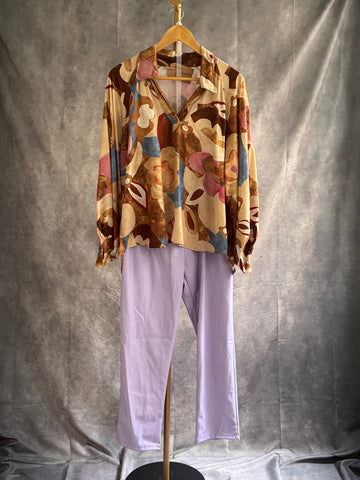 Pantalón polipiel malva