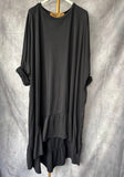 Camiseta larga asimétrica con volantes