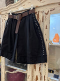 Bermudas negras Tachuelas