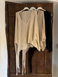 Jersey asimétrico crudo