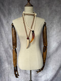 Collar largo cuerno taupe