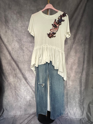 Camiseta larga con parche