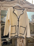 Chaqueta ribete blanca