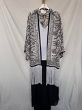 Kimono bordado con flecos