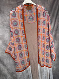 Kimono bordado con flecos
