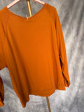 Sudadera flecos naranja