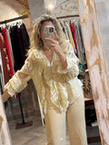 Blusa volantes beige