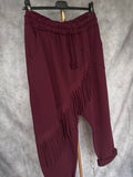 Pantalón baggy flecos Burdeos