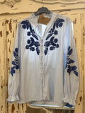Blusa rayas azul bordada