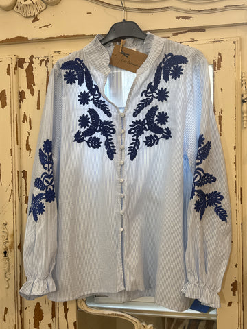 Blusa rayas azul bordada