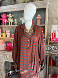 Blusa topos