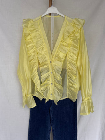 Blusa volantes amarilla