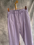Pantalón polipiel malva