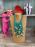 Collar caucho bolas turquesa