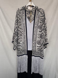 Kimono bordado con flecos