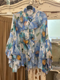 Blusa volantes
