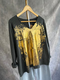Jersey gris con dorado