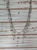 Collar largo cristales plateados