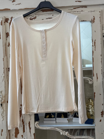 Camiseta básica botones crema