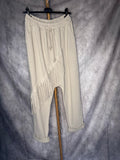 Pantalón baggy flecos claro