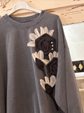 Sudadera flor gris