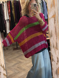 Poncho rayas lurex fucsia