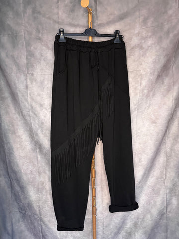Pantalón baggy flecos negro