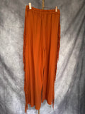 Pantalón flecos naranja
