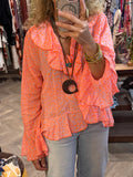 Blusa animal print naranja flúor