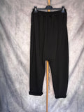 Pantalón baggy flecos negro