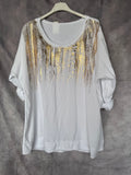 Camiseta blanca con dorado
