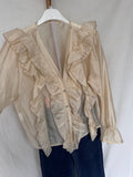 Blusa volantes beige