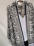 Kimono bordado con flecos