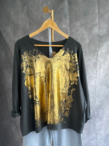 Jersey gris con dorado