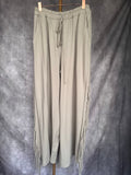 Pantalón flecos piedra