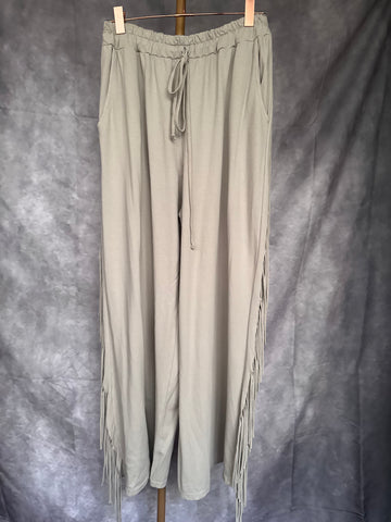 Pantalón flecos piedra